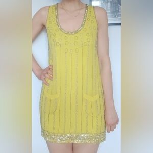Yellow Sleeveless Silk Dress with Silver Beading